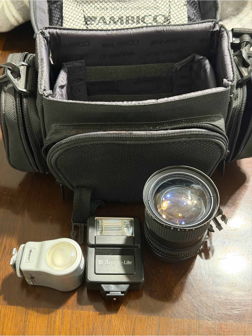 Black Camera Bag with Padded Compartments and Accessory Pockets